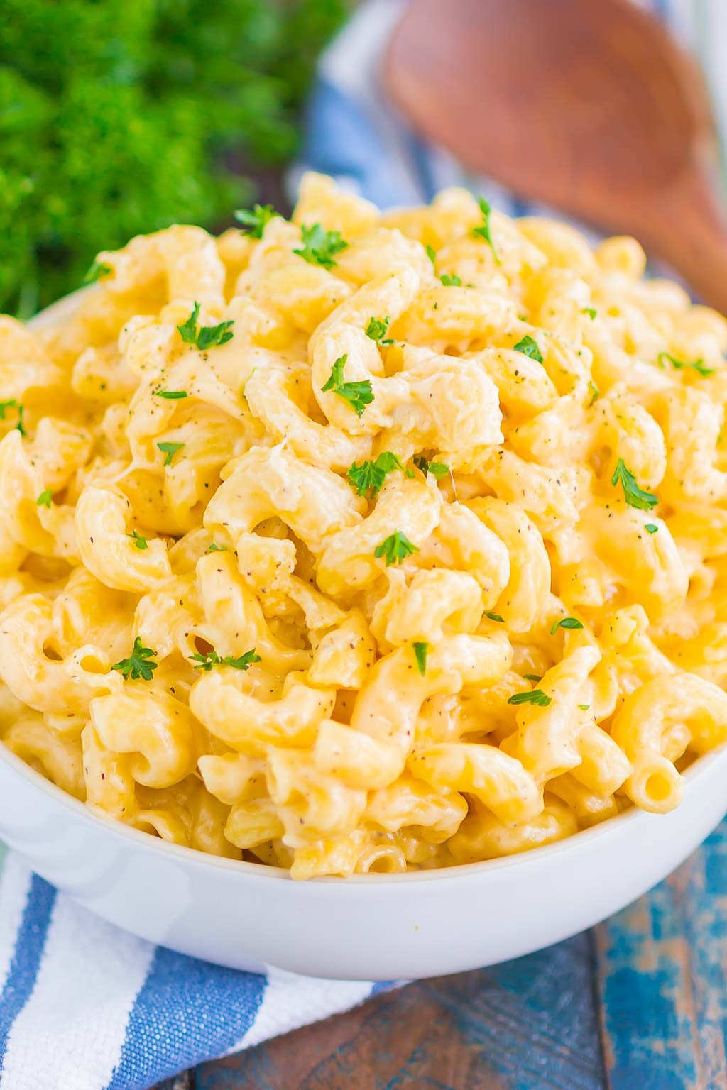 A large white bowl of creamy stovetop mac and cheese. 